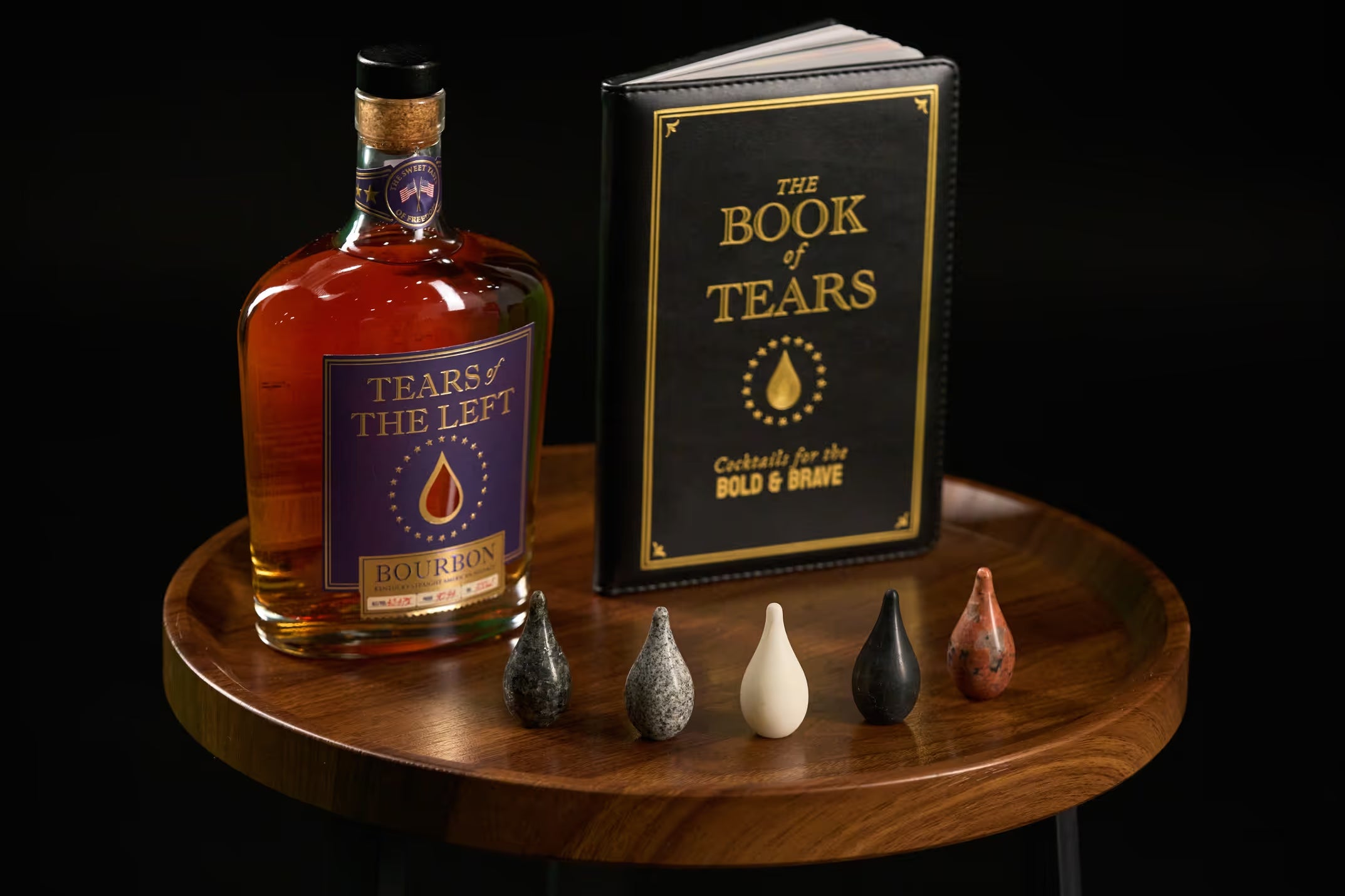 Tears of the Left bourbon bottle, Book of Tears, and whiskey stones